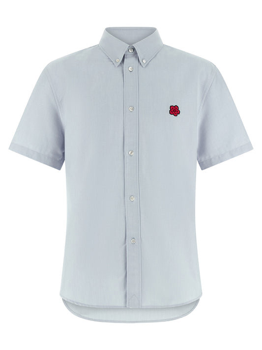 Shirt by Kenzo for men in cotton light-blue presents a discerning silhouette, showcasing a sophisticated and for a truly discerning finish.