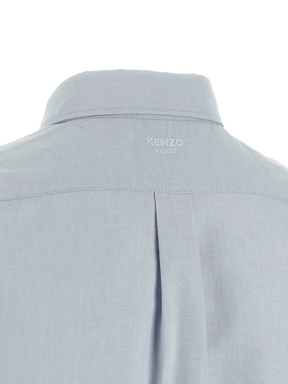 Shirt by Kenzo for men in cotton light-blue showcases a sharp silhouette, elegantly detailed with a sharp and sharp .