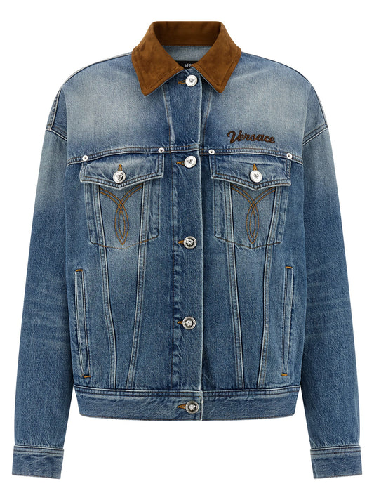 Trucker Jacket by Versace for women in denim cotton & suede leather blue presents a effortlessly chic silhouette, showcasing a sophisticated and premium for a truly effortlessly chic finish.