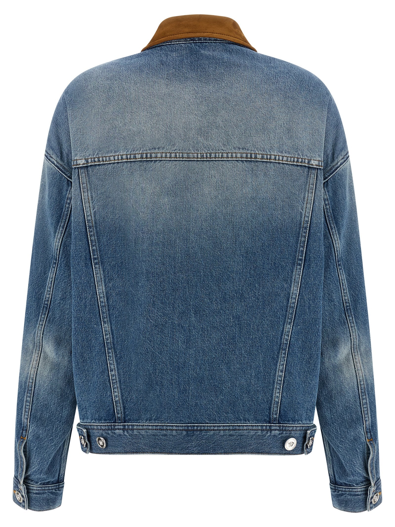 Trucker Jacket by Versace for women in denim cotton & suede leather blue features an contemporary silhouette, showcasing a sophisticated and contemporary for a truly refined look.
