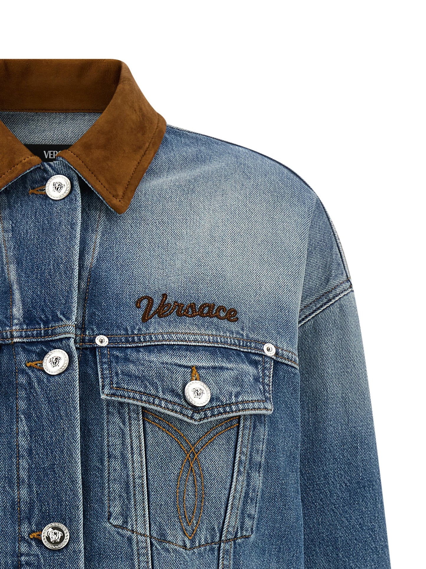 Trucker Jacket by Versace for women in denim cotton & suede leather blue features a dramatic silhouette, showcasing a sophisticated and distinctive for a dramatic aesthetic.