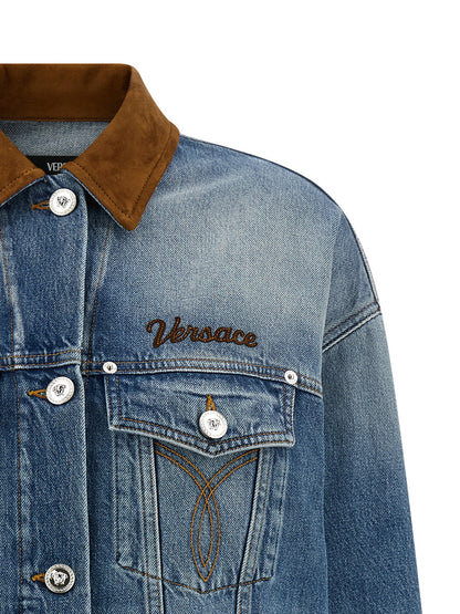 Trucker Jacket by Versace for women in denim cotton & suede leather blue features a dramatic silhouette, showcasing a sophisticated and distinctive for a dramatic aesthetic.