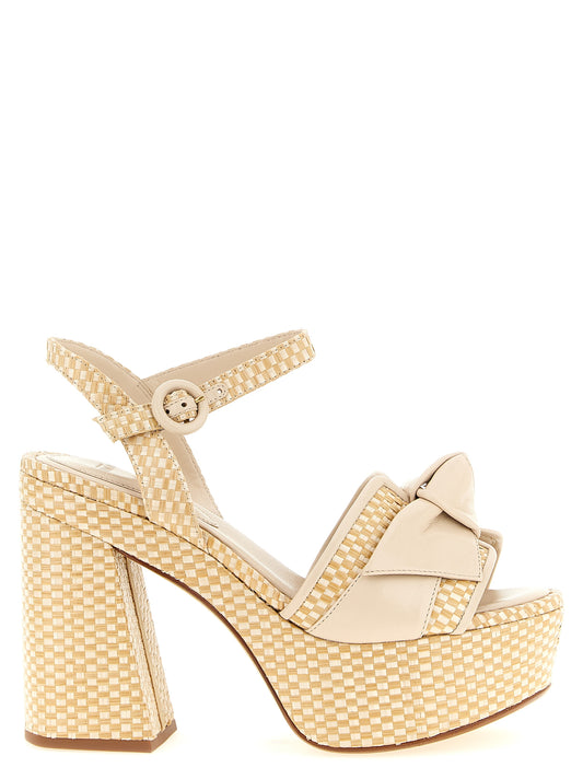 Platform Stiletto Ankle Strap Sandals by Alexandre Birman for women in raffia & bos taurus cowhide leather and beige & natural presents a captivating silhouette, showcasing the signature style of the Women's Raffia & Bos Taurus Cowhide Leather Platform Stiletto Ankle Strap Sandals with a captivating stiletto platform and captivating .