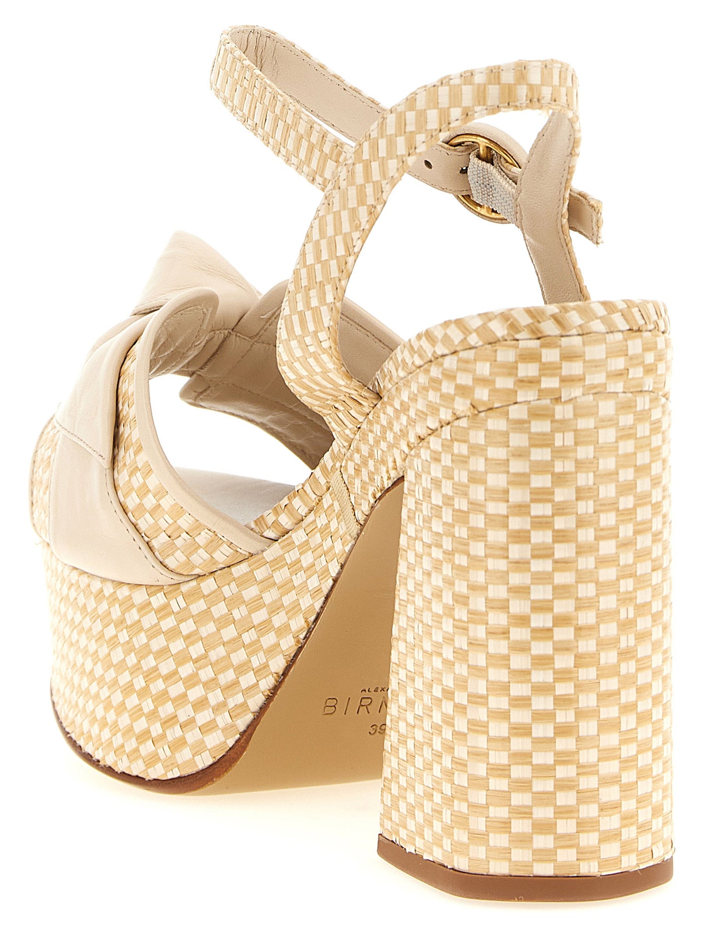Platform Stiletto Ankle Strap Sandals by Alexandre Birman for women in raffia & bos taurus cowhide leather beige & natural features an exquisite silhouette, showcasing the exquisite Women's Raffia & Bos Taurus Cowhide Leather Platform Stiletto Ankle Strap Sandals with a stiletto platform and .