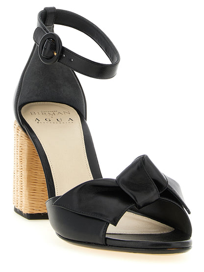 Stiletto Ankle Strap Sandals by Alexandre Birman for women in raffia & bos taurus cowhide leather black features an exquisite silhouette, showcasing the exquisite Women's Raffia & Bos Taurus Cowhide Leather Stiletto Ankle Strap Sandals with a stiletto and .