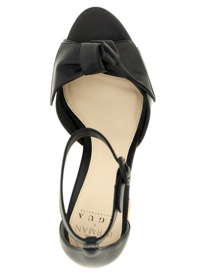 Stiletto Ankle Strap Sandals by Alexandre Birman for women in raffia & bos taurus cowhide leather black features an architectural design from the Women's Raffia & Bos Taurus Cowhide Leather Stiletto Ankle Strap Sandals collection, defined by a architectural stiletto and for a architectural finish.