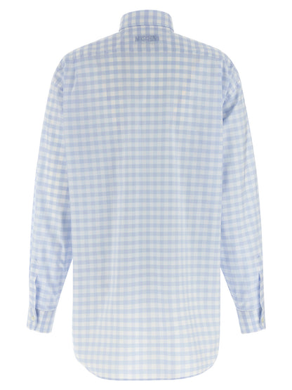 Blouse by Moschino for women in cotton light-blue & patterned showcases a sharp silhouette, elegantly detailed with a sharp and sharp .