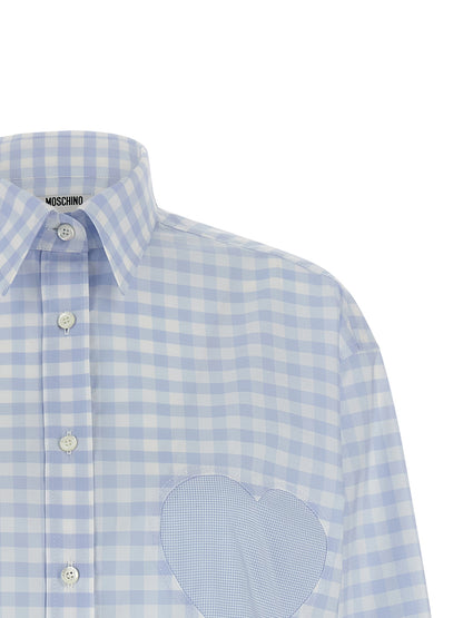 Blouse by Moschino for women in cotton light-blue & patterned, featuring a nuanced and nuanced for a sophisticated finish.