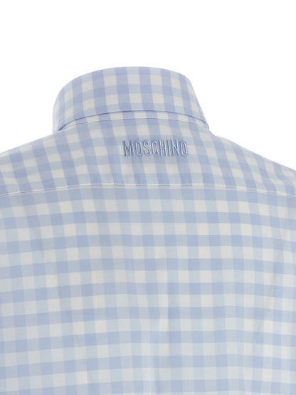 Blouse by Moschino for women in cotton light-blue & patterned features an polished silhouette, showcasing a sophisticated and detail for a truly polished finish.