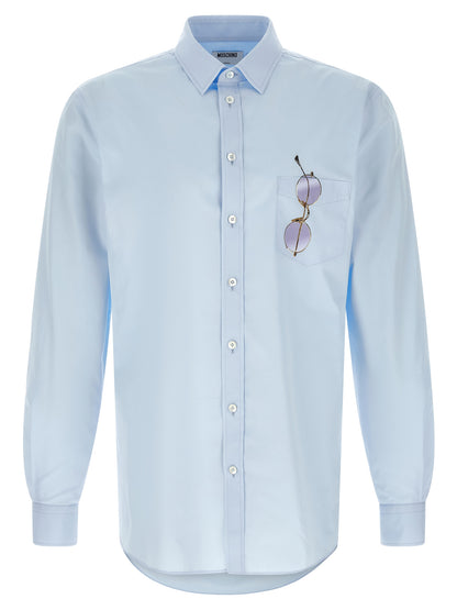 Shirt by Moschino for men in cotton light-blue & print presents a discerning silhouette, showcasing a sophisticated and for a truly discerning finish.