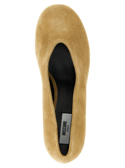 Mid-Heel Spool Pumps Heels by Moschino for women in suede calfskin leather beige showcases a exquisite silhouette, perfectly accentuating Women's Suede Calfskin Leather Mid-Heel Spool Pumps Heels with a exquisite mid-heel spool-heel and exquisite .