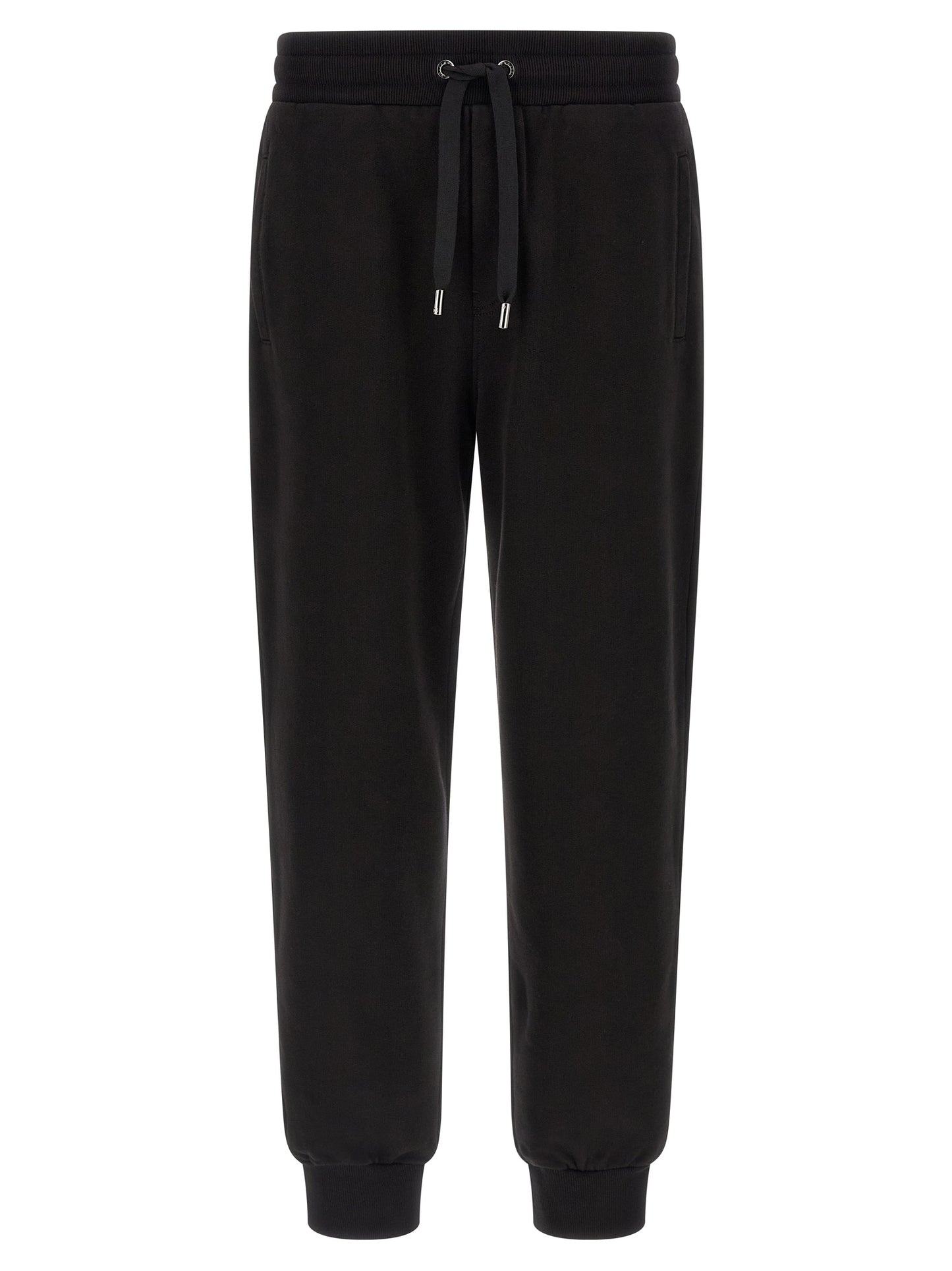 Joggers by Dolce & Gabbana for men in cotton black presents a refined pantology silhouette, artfully defined by a refined pantology , long, and a sophisticated .