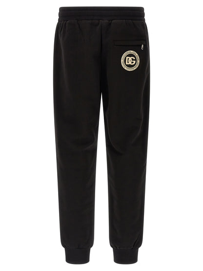 Joggers by Dolce & Gabbana for men in cotton black features a polished silhouette with a polished , reaching a polished long and finished with a polished .