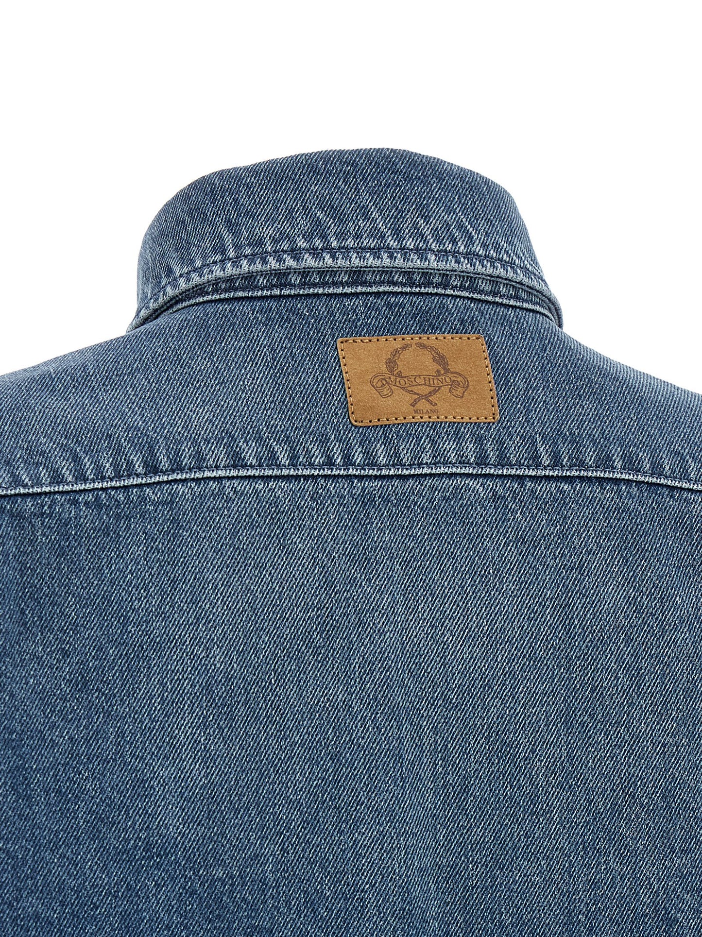 Blouse by Moschino for women in cotton denim blue presents a discerning silhouette, showcasing a sophisticated and for a truly discerning finish.