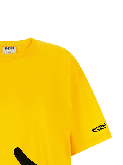 T-Shirt by Moschino for women in organic cotton bicolour, yellow, signature & print showcases a fashionable silhouette, elegantly detailed with a fashionable and crew neckline for a sophisticated, high-fashion look.