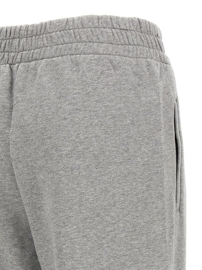 Joggers by Off-White for women in cotton gray & white features an sophisticated and with a precise long, creating a sophisticated and sophisticated silhouette.
