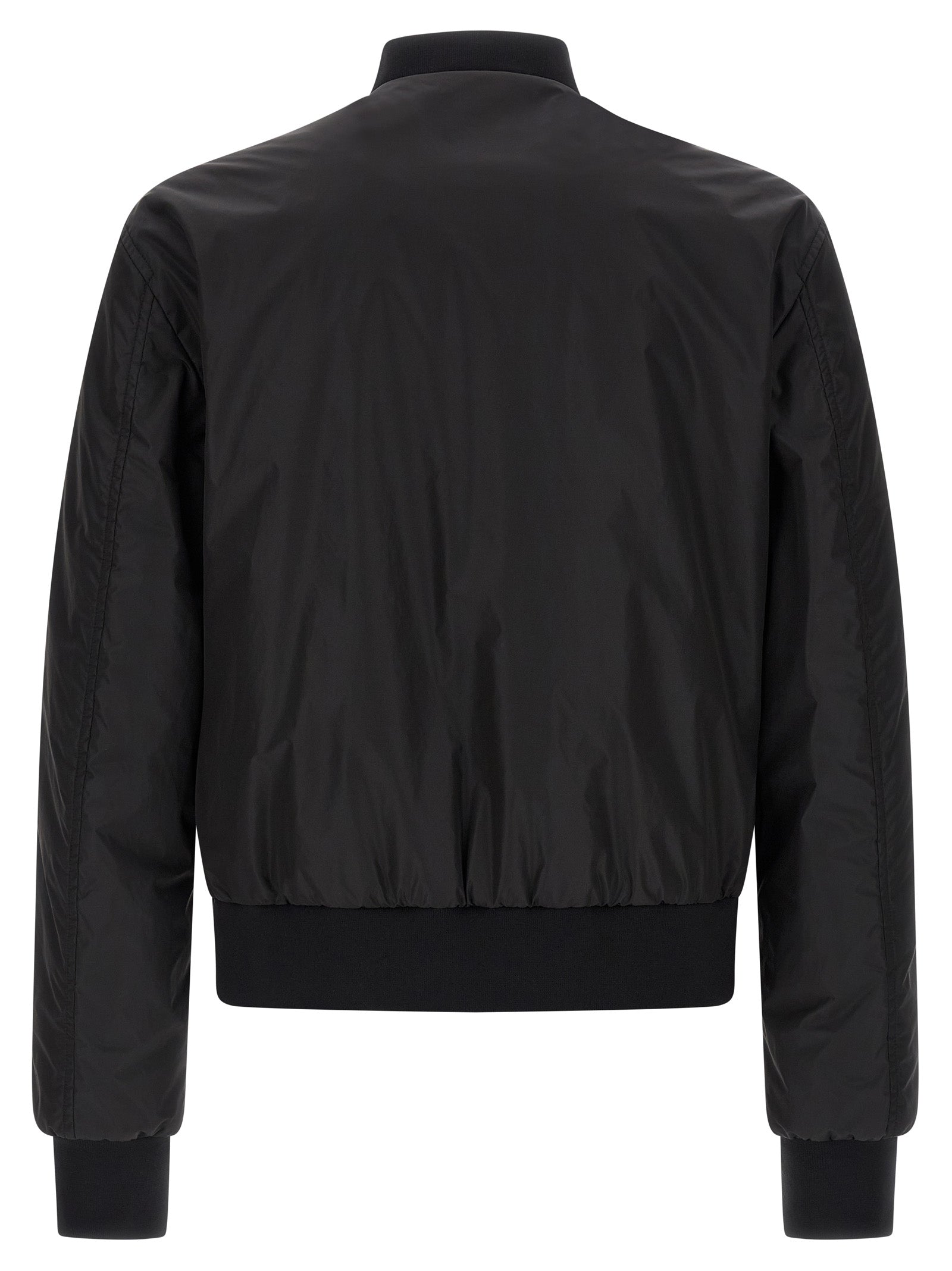 Bomber Jacket by Dolce & Gabbana for men in polyamide black showcases a bohemian silhouette, artfully detailed with a bohemian and signature pockets for a truly bohemian finish.