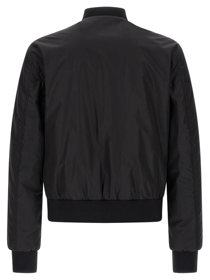 Bomber Jacket by Dolce & Gabbana for men in polyamide black showcases a bohemian silhouette, artfully detailed with a bohemian and signature pockets for a truly bohemian finish.