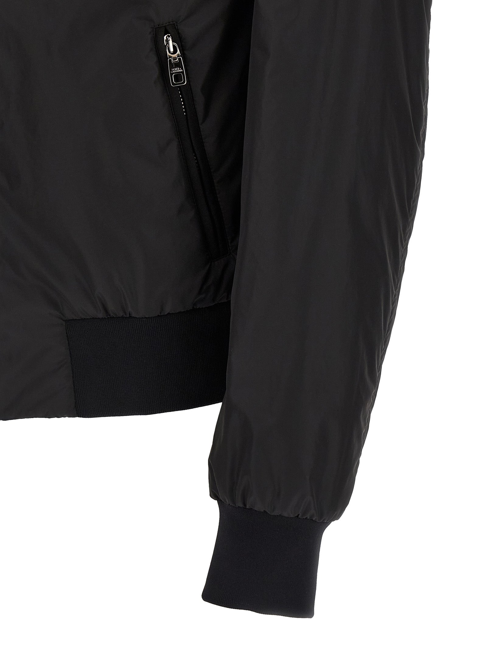 Bomber Jacket by Dolce & Gabbana for men in polyamide black features an contemporary silhouette, showcasing a sophisticated and contemporary pockets for a truly refined look.