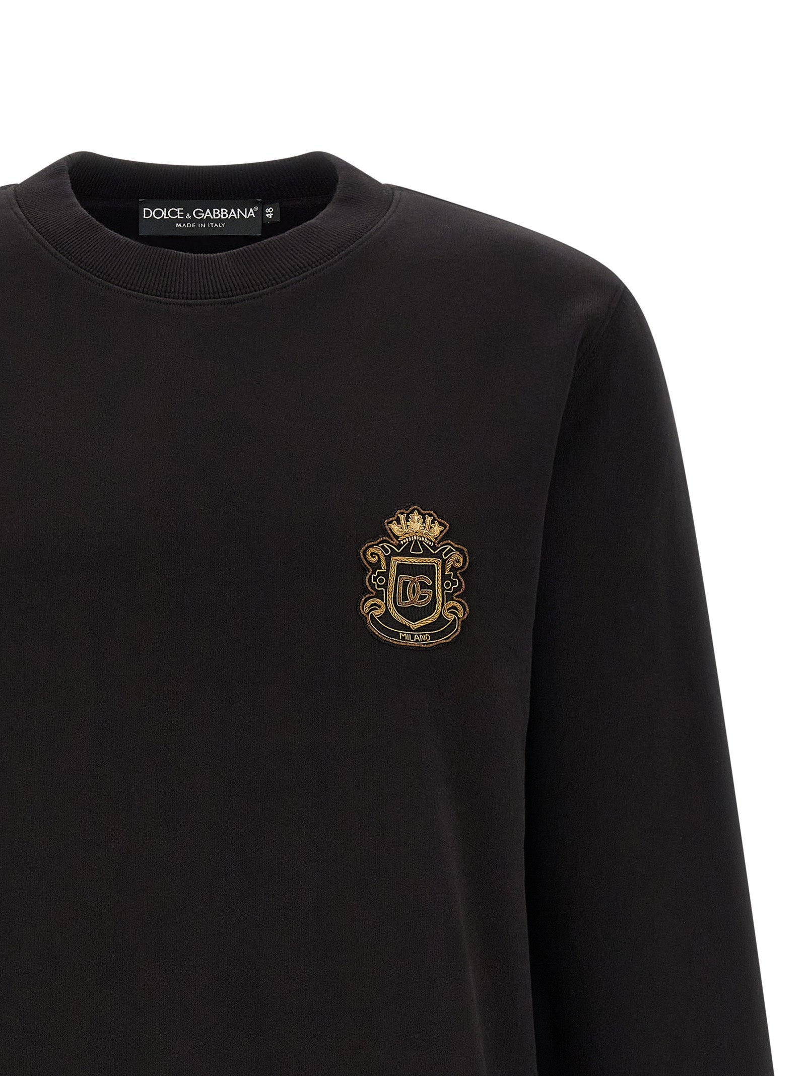 Sweatshirt by Dolce & Gabbana for men in cotton black features an provocated silhouette, detailed with a provocated and a refined crew neckline for a sophisticated aesthetic.