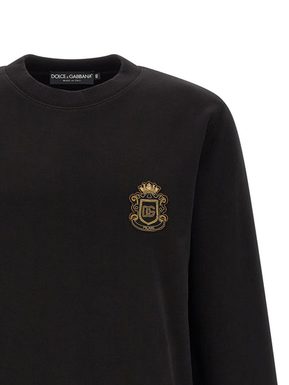 Sweatshirt by Dolce & Gabbana for men in cotton black features an provocated silhouette, detailed with a provocated and a refined crew neckline for a sophisticated aesthetic.