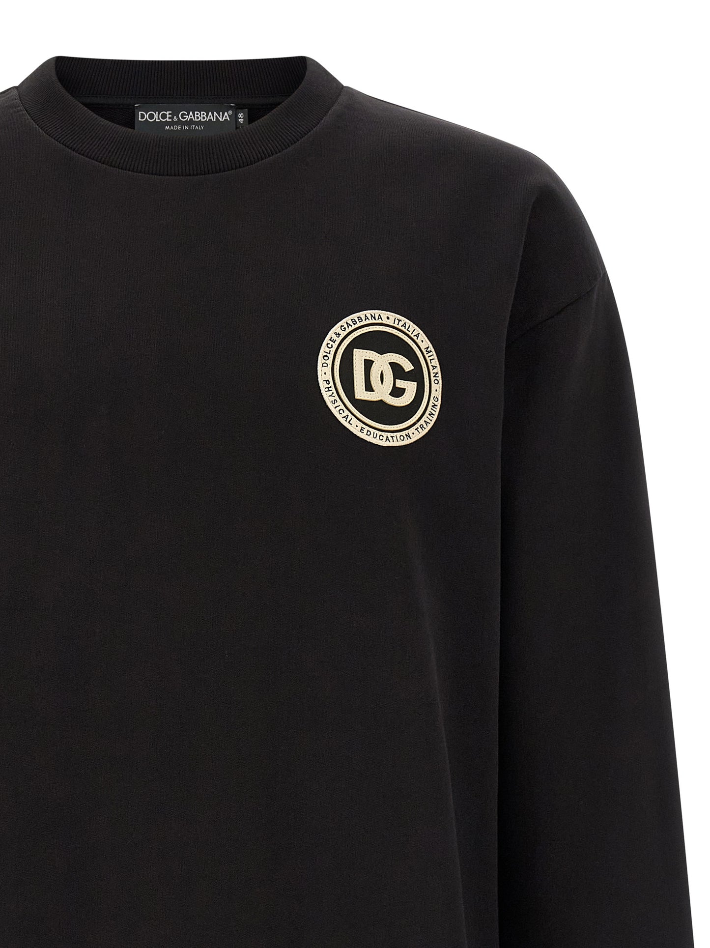 Sweatshirt by Dolce & Gabbana for men in cotton black features an provocated silhouette, detailed with a provocated and a refined crew neckline for a sophisticated aesthetic.