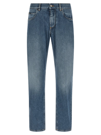 Jeans by Dolce & Gabbana for men in denim cotton blue features a polished silhouette with a polished straight-leg & regular-fit, reaching a polished long and finished with a polished .