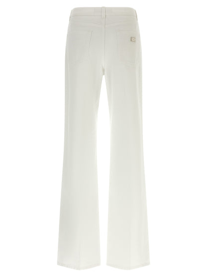 Jeans by Dolce & Gabbana for women in denim cotton white presents a tailored silhouette, showcasing a tailored flared, regular-fit & wide and long cut with a refined for a truly tailored aesthetic.