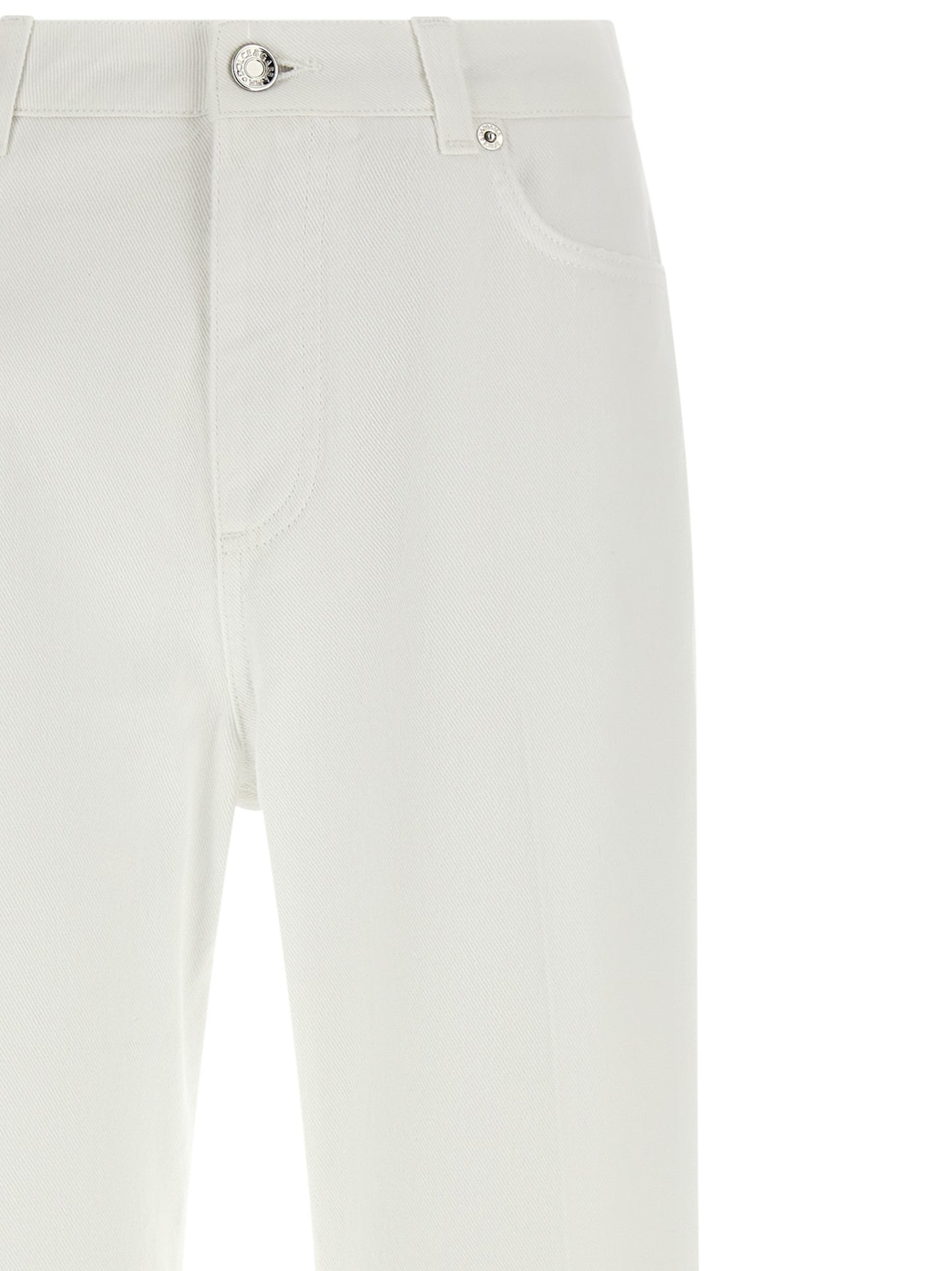 Jeans by Dolce & Gabbana for women in denim cotton white features a polished silhouette with a polished flared, regular-fit & wide, reaching a polished long and finished with a polished .