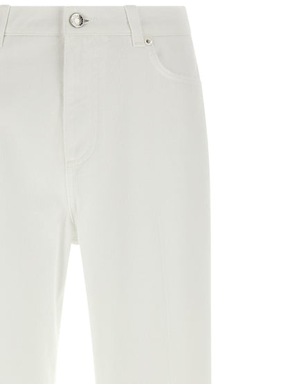 Jeans by Dolce & Gabbana for women in denim cotton white features a polished silhouette with a polished flared, regular-fit & wide, reaching a polished long and finished with a polished .
