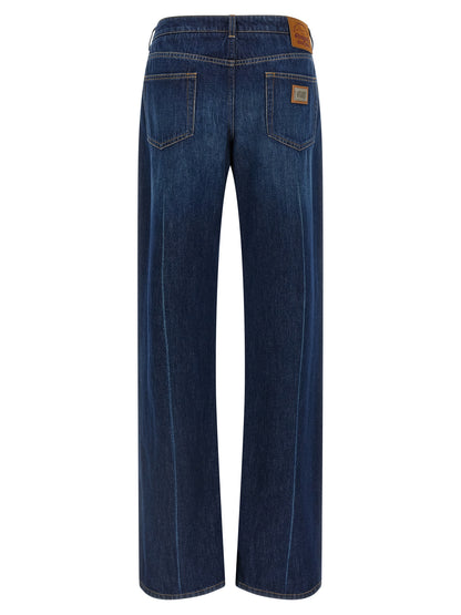 Jeans by Dolce & Gabbana for women in cotton denim blue presents a tailored silhouette, showcasing a tailored straight-leg and long cut with a refined low rise for a truly tailored aesthetic.