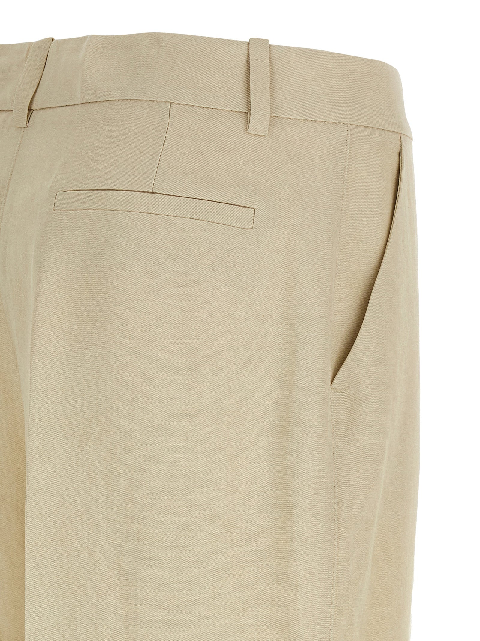 Trousers by P.A.R.O.S.H. for women in linen & viscose beige features a sculptural silhouette, showcasing a sculptural wide and long with a sophisticated for a sculptural finish.