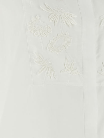 Blouse by P.A.R.O.S.H. for women in cotton white presents a discerning silhouette, showcasing a sophisticated and for a truly discerning finish.