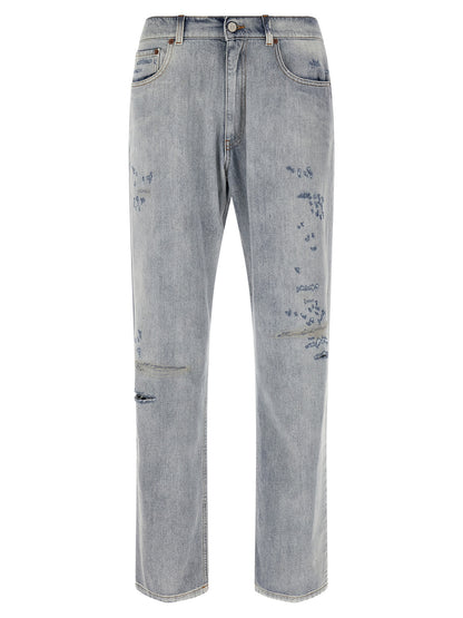 Jeans by MM6 Maison Margiela for men in denim cotton light-blue, white & signature features an sartorial straight-leg, relaxed-fit & wide and long with a cut for a sartorial finish.