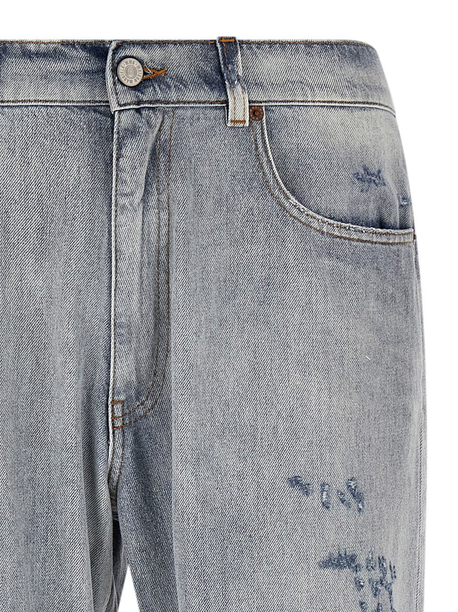 Jeans by MM6 Maison Margiela for men in denim cotton light-blue, white & signature presents a refined pantology silhouette, artfully defined by a refined pantology straight-leg, relaxed-fit & wide, long, and a sophisticated .