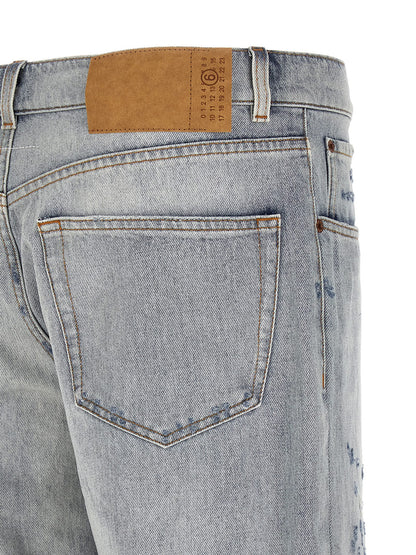 Jeans by MM6 Maison Margiela for men in denim cotton light-blue, white & signature features a refined silhouette with a refined straight-leg, relaxed-fit & wide, defined by a and a refined long for a refined finish.