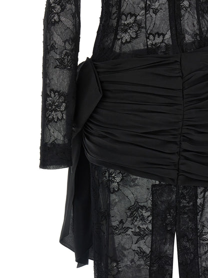 Dress by Alessandra Rich for women in polyamide silk viscose black & transparent features an magnificent silhouette, artfully detailed with a magnificent and that flows into an magnificent maxi long.