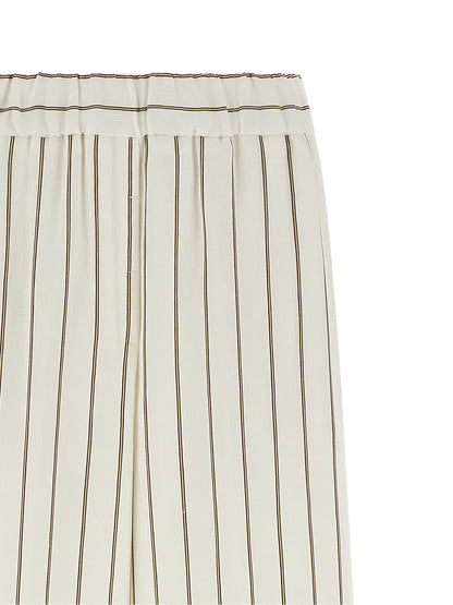 Casual Pants by Peserico for women in linen cotton twill white presents a refined pantology silhouette, artfully defined by a refined pantology straight & wide, long, and a sophisticated .