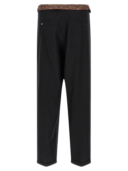 Casual Pants by Magliano for men in cotton black presents a refined pantology silhouette, artfully defined by a refined pantology wide, long, and a sophisticated .