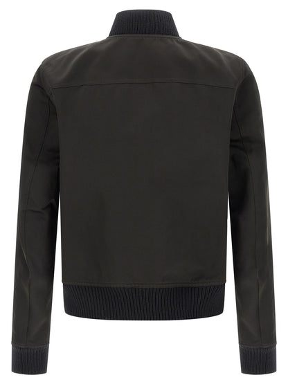 Bomber Jacket by Rick Owens for men in polyester cotton wool black features an contemporary silhouette, showcasing a sophisticated high-neck neckline and contemporary pockets for a truly refined look.