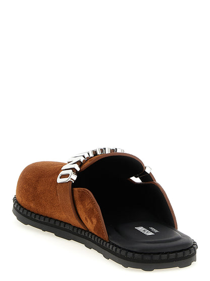 Clogs Flat Shoes by Moschino for women in tu & suede calfskin leather brown showcases a resplendent Women's TU & Suede Calfskin Leather Clogs Flat Shoes aesthetic with a and .