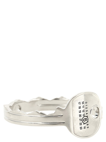 Bracelet by MM6 Maison Margiela for women in virgin wool silver & signature showcases a cosmopolitan silhouette, artfully capturing the essence of the cosmopolitan Women's Bangle Silver Brass Bracelet with a cosmopolitan bangle bracelet design.