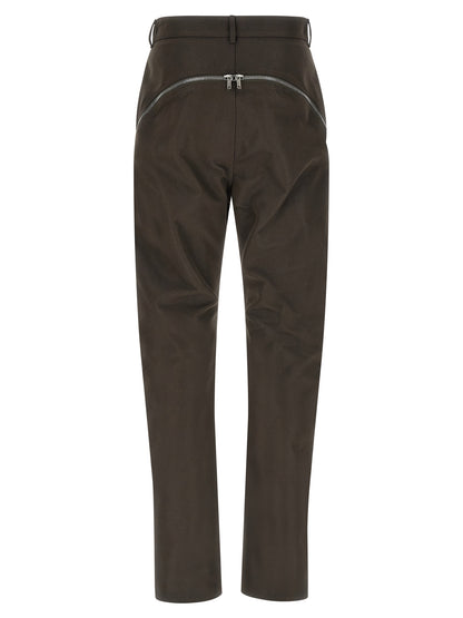 Casual Pants by Rick Owens for men in nylon cotton brown presents a refined pantology silhouette, artfully defined by a refined pantology , long, and a sophisticated high rise.