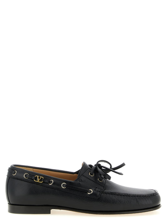 This Boat Loafer Slip-On Lace-Up Shoes by Valentino Garavani for men in buffalo & calf leather black & signature features an exquisite silhouette from the V Logo Men's Buffalo & Calf Leather Boat Loafer Slip-On Lace-Up Shoes collection, defined by a sophisticated and elegant square toe style.