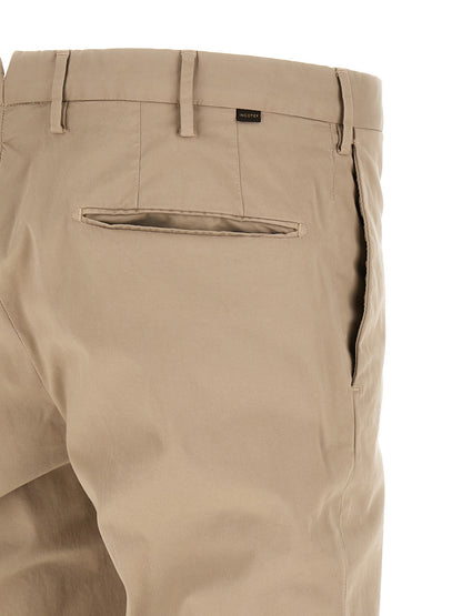 Trousers by Incotex for men in stretch cotton beige features an sartorial silhouette, showcasing a precise and long with a sartorial for a refined look.