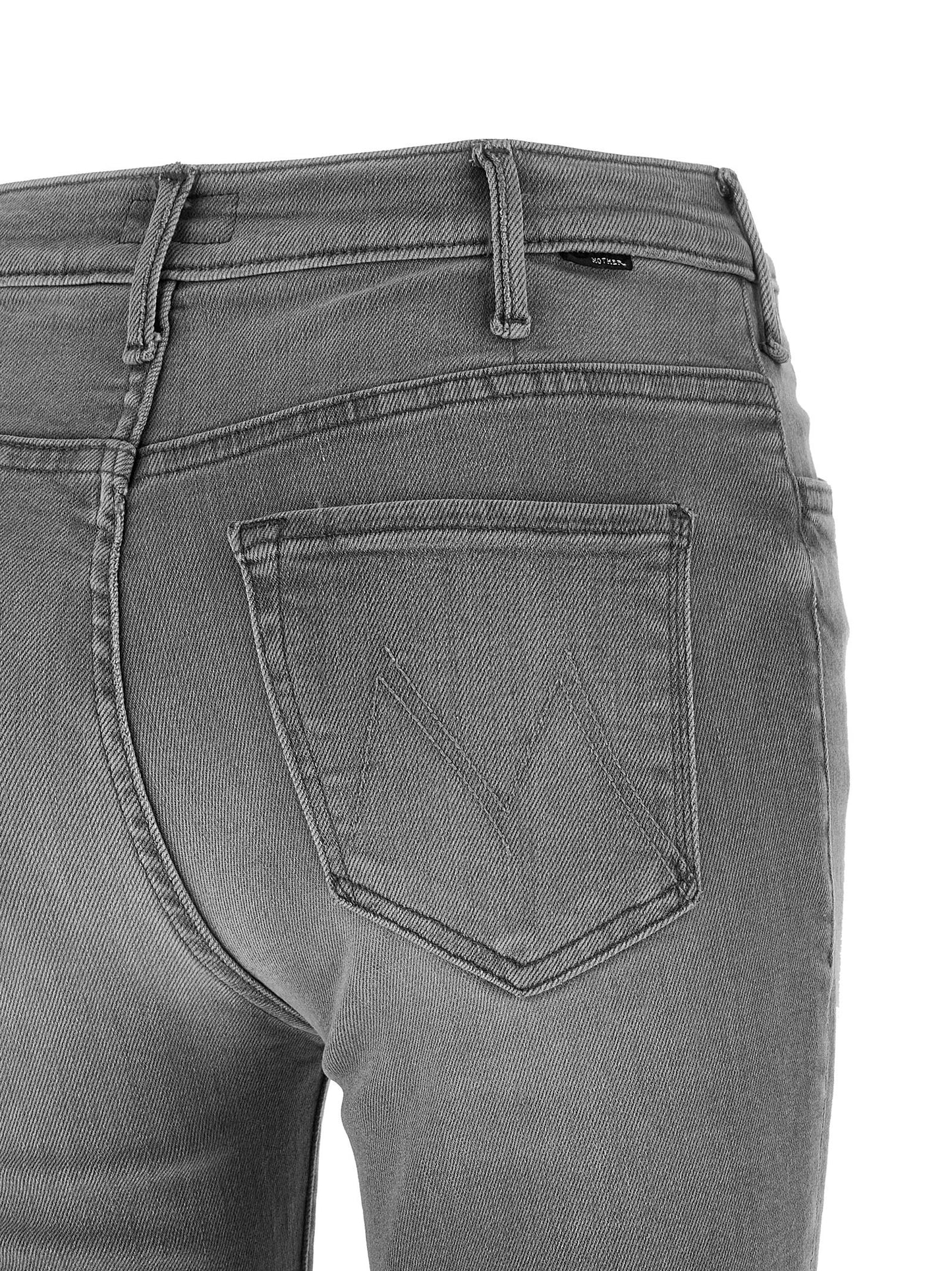 Jeans by Mother Denim for women in stretch denim cotton polyester gray features a polished silhouette with a polished skinny-leg & skinny, reaching a polished short and finished with a polished .