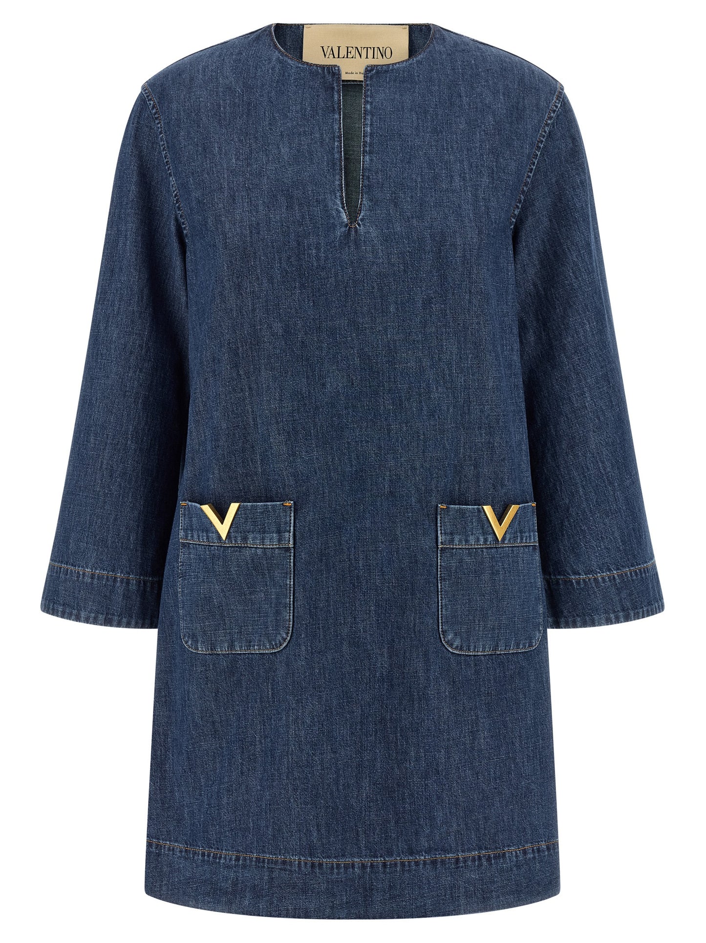 Dress by Valentino Garavani for women in denim cotton blue features an cute silhouette, detailed with a and v-neck neckline that elegantly flows into a cute short.