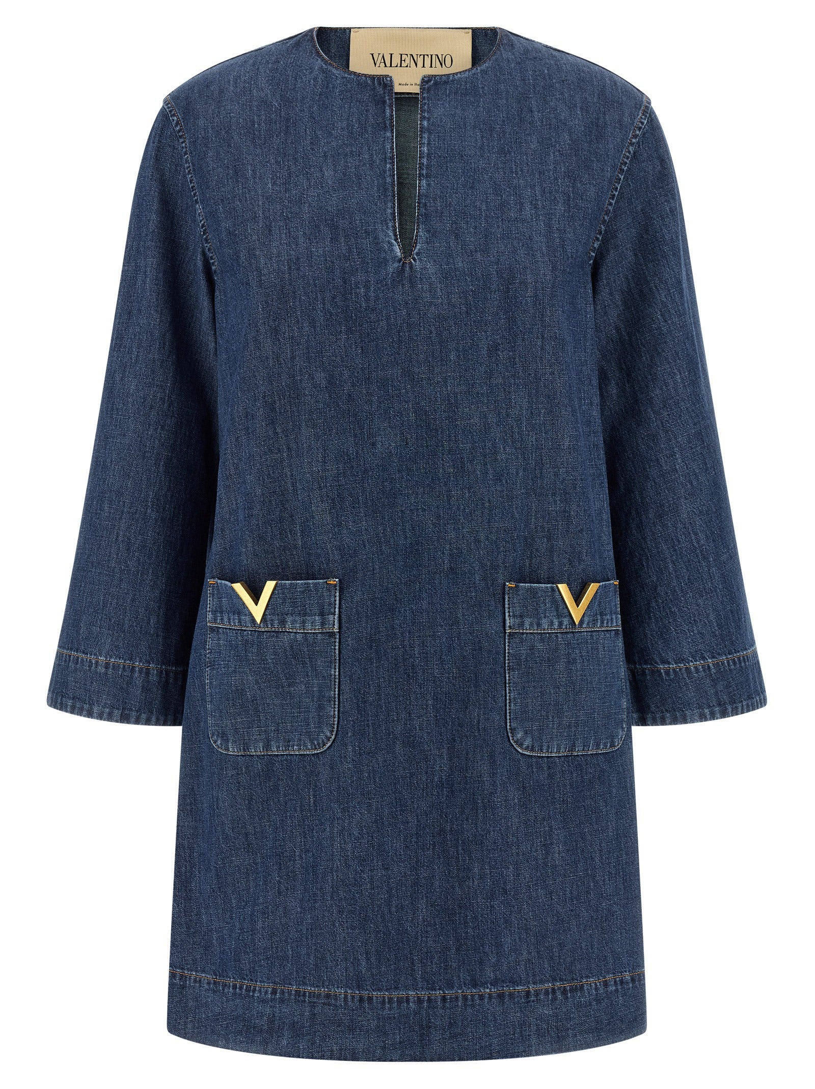 Dress by Valentino Garavani for women in denim cotton blue features an cute silhouette, detailed with a and v-neck neckline that elegantly flows into a cute short.