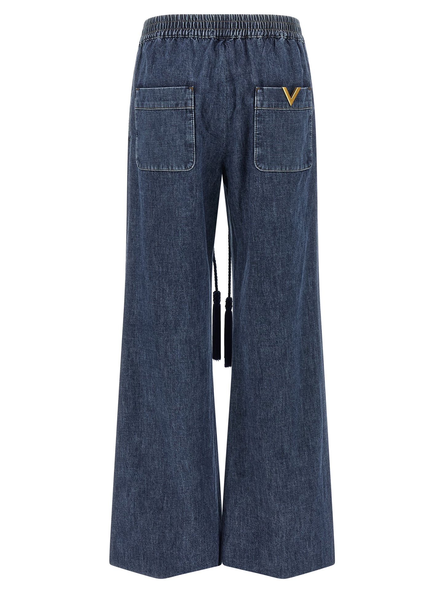 Jeans by Valentino Garavani for women in denim cotton blue features a polished silhouette with a polished flared & wide, reaching a polished long and finished with a polished .