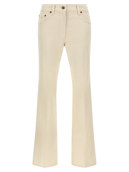 Jeans by Valentino Garavani for women in denim cotton beige presents a tailored silhouette, showcasing a tailored flared and long cut with a refined for a truly tailored aesthetic.